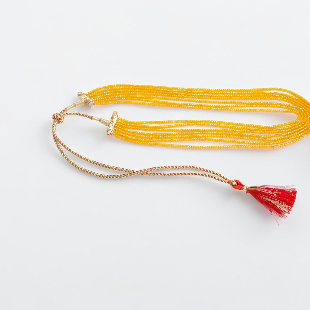 Collana Zirconi Arancioni Sfaccettati, 7 Fili.