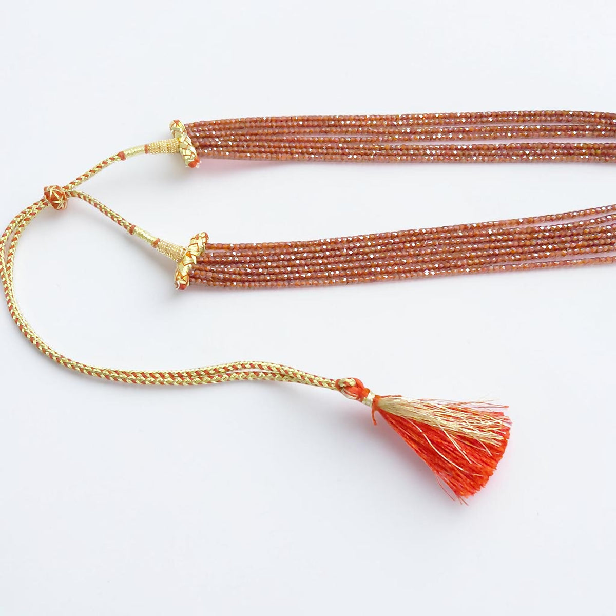 Collana Zirconi Rossi Sfaccettati, 7 Fili.